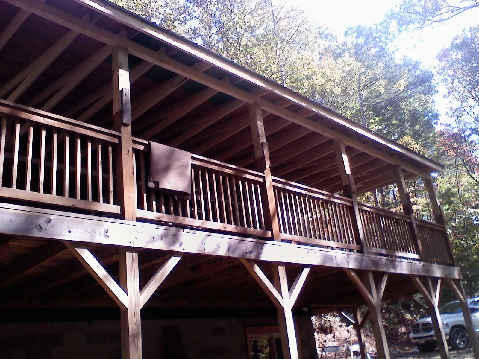 Timber framing under a new elevated porch and deck — Roof Leak Repair in James Creek by Roofing Brothers